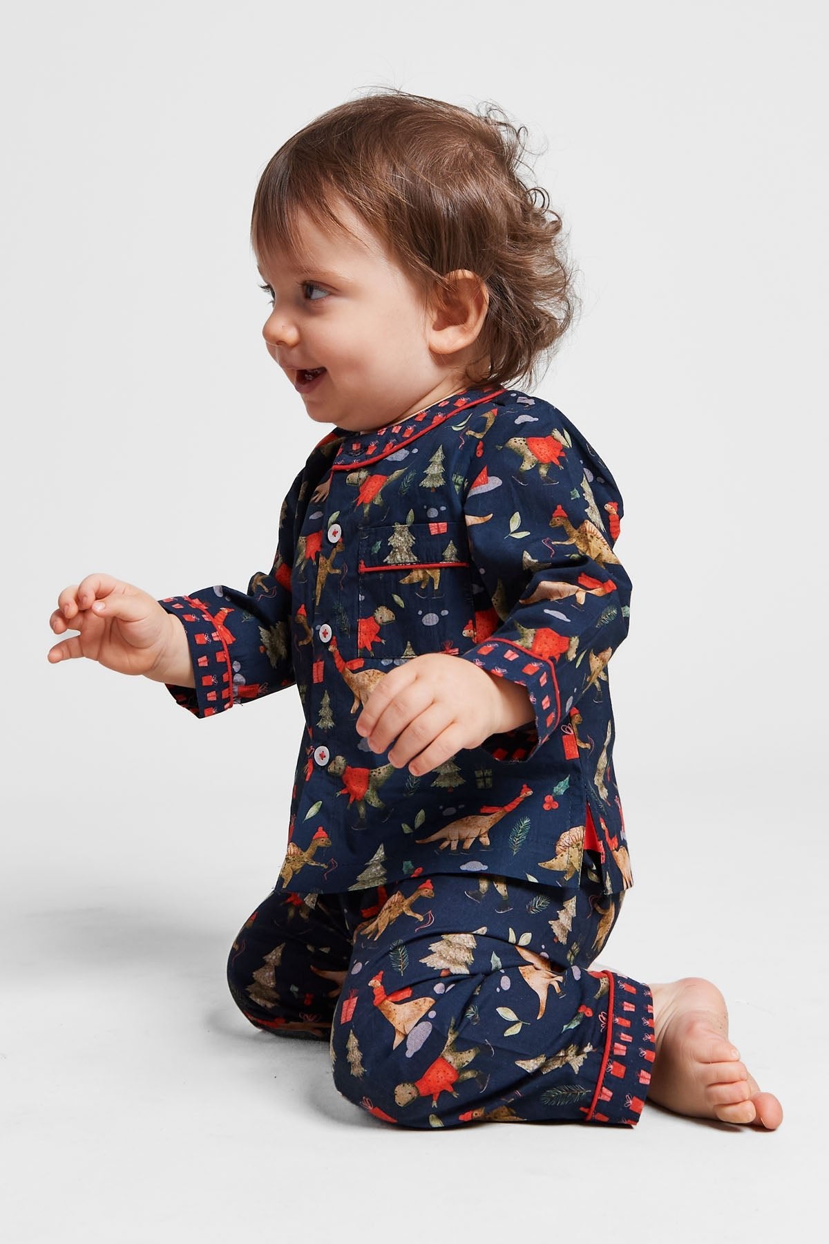 a jurassic christmas - organic cotton baby pyjama set - Kutti Lulu