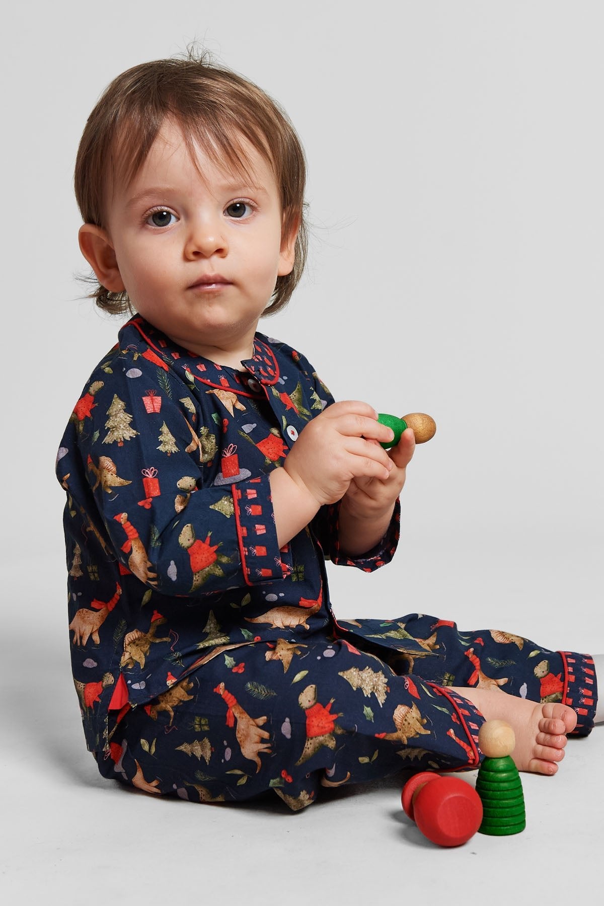 a jurassic christmas - organic cotton baby pyjama set - Kutti Lulu